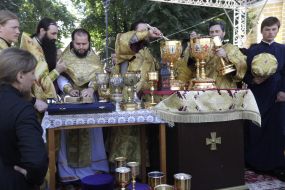 Priests prepare the sacrament