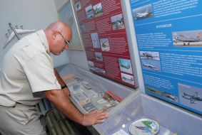 A visitor examines exhibits