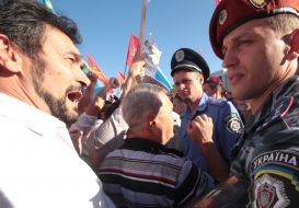 The Crimean Tatars are trying to break to the stage during a speech of Petr Simonenko