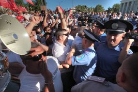 The Crimean Tatars are trying to break to the stage during a speech of Petr Simonenko