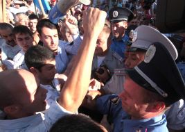 The Crimean Tatars are trying to break to the stage during a speech of Petr Simonenko