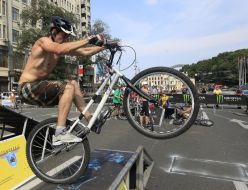Young man executes a trick on the bicycle 