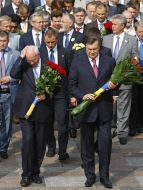 Participants of ceremony of laying-on of flowers