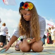 Girl drawing with chalk