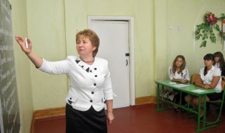 The teacher conducts lesson