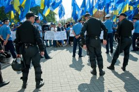 Police officers near the supporters of language law