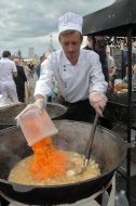 The cook prepares a pilau