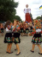 Girls are dancing in Ukrainian national costumes
