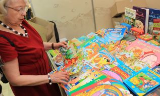 Woman consider books