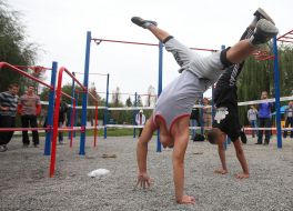 Children execute acrobatic exercises