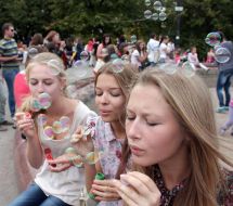 Participants of holiday of soap bubbles
