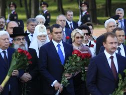 Participants of flower laying ceremony