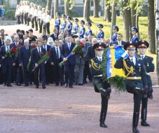 Participants of flower laying ceremony