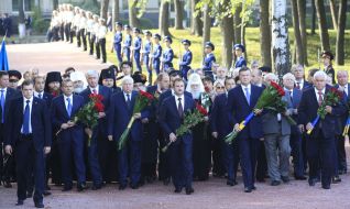 Participants of flower laying ceremony