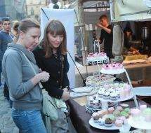 Visitors considering the festival sweets