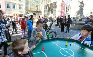 The boys play table football