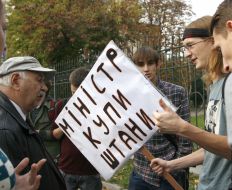 Protesters holding poster