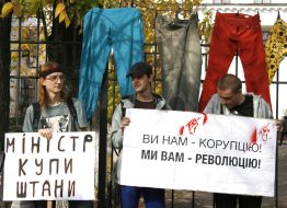 Protesters holding posters
