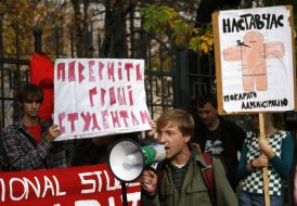 Protesters holding posters