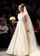 The model demonstrates clothes