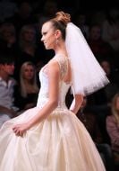 The model demonstrates clothes