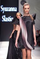 The model demonstrates clothes