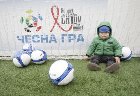 Child near of footballs