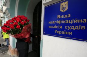 A man with a bouquet of roses