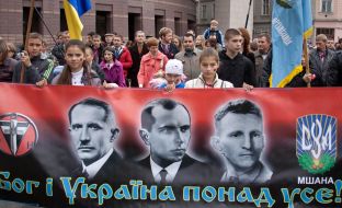 Schoolchildren carry poster