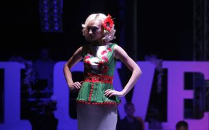 Model demonstrates a wedding dress