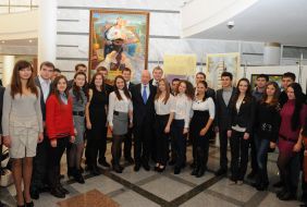 Nikolay Azarov taken pictures with students
