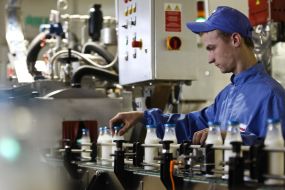 Worker of milk factory