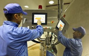 Worker of milk factory