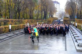 Participants in the ceremony of laying flowers