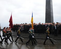 Participants in the ceremony of laying flowers