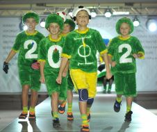 The model demonstrates clothes