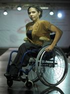 The model demonstrates clothes