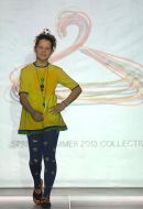 The model demonstrates clothes