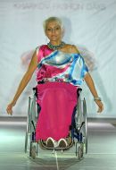 The model demonstrates clothes