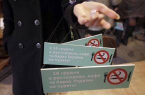 Participant in campaign keeps signs