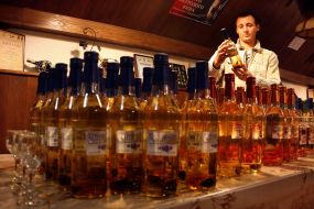 A young man sees a bottle