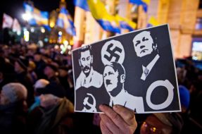 Postcard with the image of Stalin, Hitler and Viktor Yanukovich