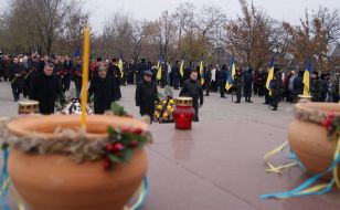 The participants of ceremony of laying flowers