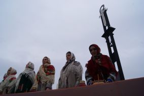 The participants of ceremony of laying flowers