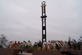 The participants of ceremony of laying flowers