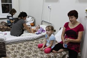 Patients sit in one of the chambers