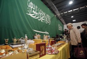 A woman considers souvenirs