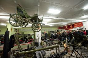 Visitors view military equipment