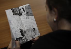 Participant of presentation examines album