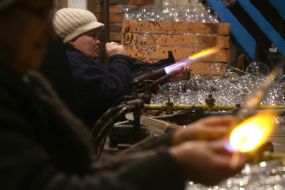 Glassblower blows Christmas toy
